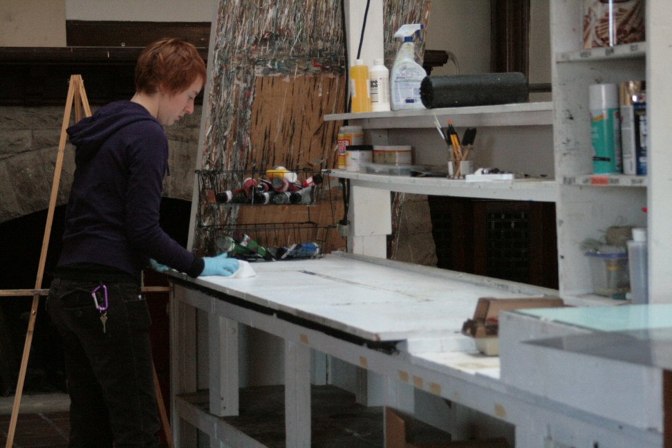 Mary Beth starts work on another table